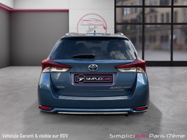 Toyota auris touring sports hybride 136h design/entretien a jour/garantie 12 mois occasion paris 17ème (75)(porte maillot)...