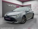 Toyota corolla hybride my21 122h design - suivi complet - faible kms - garantie 12 mois occasion simplicicar lyon nord...