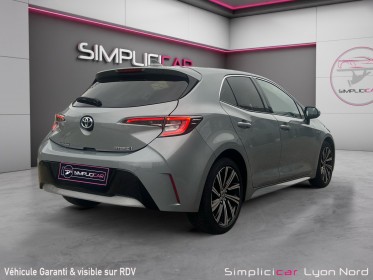 Toyota corolla hybride my21 122h design - suivi complet - faible kms - garantie 12 mois occasion simplicicar lyon nord...