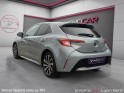 Toyota corolla hybride my21 122h design - suivi complet - faible kms - garantie 12 mois occasion simplicicar lyon nord...