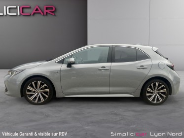 Toyota corolla hybride my21 122h design - suivi complet - faible kms - garantie 12 mois occasion simplicicar lyon nord...