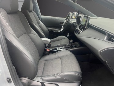 Toyota corolla hybride my21 122h design - suivi complet - faible kms - garantie 12 mois occasion simplicicar lyon nord...