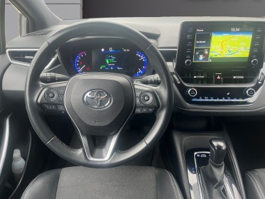 Toyota corolla hybride my21 122h design - suivi complet - faible kms - garantie 12 mois occasion simplicicar lyon nord...