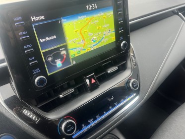 Toyota corolla hybride my21 122h design - suivi complet - faible kms - garantie 12 mois occasion simplicicar lyon nord...