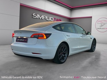 Tesla model 3 autonomie standard plus rwd garantie constructeur 2029 cable charge rapide occasion simplicicar toulouse nord...